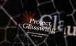 The visual for Project Glasswing is displayed on a smartphone screen placed on a reflectiv...