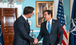 NATO Secretary General Mark Rutte (left) gestures with a double thumbs-up during a photo o...