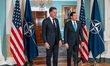 NATO Secretary General Mark Rutte (left) gestures with a double thumbs-up during a photo o...