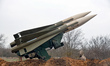 A launcher of the MIM-23 Hawk surface-to-air missile system is used by servicemen of the 2...