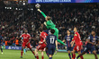 Paris Saint-Germain goalkeeper Matvey Safonov punches the ball clear during the UEFA Champ...