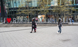 People walk outside the Rhein-Galerie shopping mall in Ludwigshafen am Rhein, Rhineland-Pa...