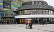People walk outside the Rhein-Galerie shopping mall in Ludwigshafen am Rhein, Rhineland-Pa...