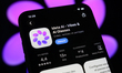 The download page for the new Meta AI app on the AppStore is displayed on a smartphone scr...