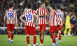 Marcos Llorente, Giuliano Simeone, and Julian Alvarez of Atletico de Madrid talk during th...