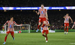 Julian Alvarez of Atletico de Madrid celebrates after scoring a goal with teammates Marcos...