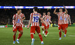 Julian Alvarez of Atletico de Madrid celebrates after scoring a goal with teammates Marcos...