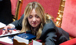 Italian Prime Minister Giorgia Meloni is in the Senate chamber during a briefing to Parlia...