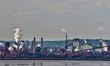 Smoke rises from the large stacks of the ArcelorMittal Dofasco Inc. steel plant in Hamilto...