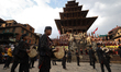 Nepali artists from the Newa: community perform with the Dhime, a traditional double-heade...