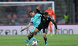 Emiliano Buendia of Aston Villa and Remo Freuler of Bologna compete during the UEFA Europa...