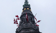 Danish flags are seen on top of the Danish Parliament in Copenhagen, Denmark, on March 24,...