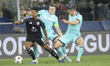 Youri Tielemans of Aston Villa FC competes for the ball with Remo Freuler and Lewis Fergus...