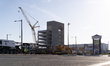 A worker walks near the scene of a partially collapsed parking garage in Philadelphia, Uni...