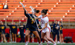 Emma Burke of the Michigan Wolverines and Annalise Messina of the Rutgers Scarlet Knights...