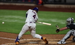 Francisco Alvarez of the New York Mets bats during the fourth inning of a baseball game ag...