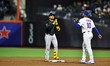 Arizona Diamondbacks player Gabriel Moreno #14 stands on second base with a double during...
