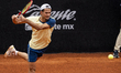 J. Ficovich returns the ball to J.A. Hernandez in the men's singles round of 16 of the ATP...