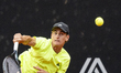 Bor Artnak returns the ball to Rodrigo Pacheco in the men's singles round of 16 of the ATP...