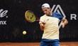 J. Ficovich returns the ball to J. A. Hernandez in the men's singles round of 16 of the AT...