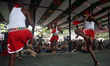 A traditional stick-fighting performance takes place at the Central Shaheed Minar to mark...