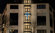 Illuminated Scientology signage is displayed on the facade of the Church of Scientology bu...