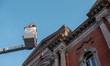 A swarm of bees forms a hive on the exterior of the Smithsonian Renwick Gallery, located n...