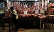 A butcher prepares fresh lamb cuts at the Varvakios Central Municipal Market in Athens, Gr...