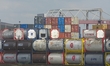 A general view of the loading zone with cargo shipping containers stacked at the Port of D...