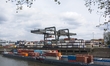 A general view of the loading zone with cargo shipping containers stacked at the Port of D...