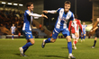 Will Goodwin of Colchester United (right) celebrates after scoring during the Sky Bet Leag...