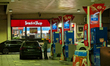 An Esso gas station operates at night in Stuttgart, Baden-Wuerttemberg, Germany, on April...