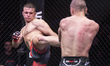Croatian fighter Luka Miklecic (right) competes against Serbian fighter Aleksandar Novakov...