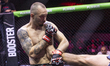 Serbian fighter Dusan Radovic competes against Portuguese fighter Rafael Hudson at the mix...