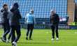 Sheffield Wednesday manager Henrik Pedersen (right) chats with players upon arrival at the...