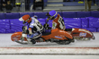 Simon Mayer of Germany, in red, rides inside Josef Kreuzberger of Austria, in blue, during...