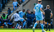 Sean Fusire of Sheffield Wednesday and Haji Wright of Coventry City battle for possession...