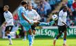 Ellis Simms of Coventry City hits the ball back to his keeper during the Sky Bet Champions...