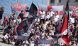 A Cremonese supporter is seen during the Serie A TIM match between Cagliari Calcio and US...
