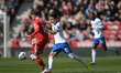 Andre Dozzell of Portsmouth FC closes down Alan Browne of Middlesbrough FC during the Sky...