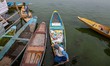 A boatman collects garbage and plastic waste from the waters of Dal Lake in Srinagar, Jamm...