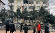 Turkish civil defense teams (AFAD) search for survivors under the rubble amid extensive bu...