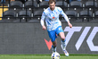Tom Barkhuizen of Barrow AFC moves forward with the ball during the Sky Bet League 2 match...