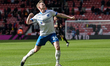 Aji Alese of Portsmouth FC celebrates Portsmouth's win after the Sky Bet Championship matc...