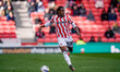 Bosun Lawal of Stoke City makes a run with the ball during the Sky Bet Championship match...