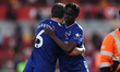 James Tarkowski hugs Tyrique George of Everton after the Premier League match between Bren...