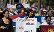 People gather for a national demonstration in support of the Cuban people in Rome, Italy,...
