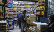 An Iranian man stands in a supermarket in downtown Tehran, Iran, on April 11, 2026, amid I...