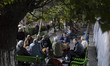 Elderly Iranian men play backgammon at a small local park in downtown Tehran, Iran, on Apr...