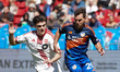Alonso Coello #14 of Toronto FC and Pavel Bucha #20 of FC Cincinnati compete for the ball...